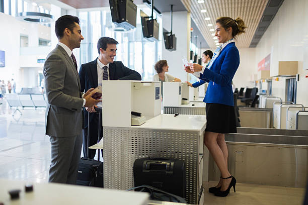 istock Check in counter stewardess and business traveler. 624389384