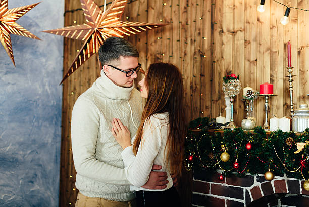 istock in love couple in studio Christmas 624391072