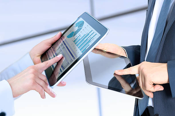 istock Business woman and man working and analyzing financial figures 624391300