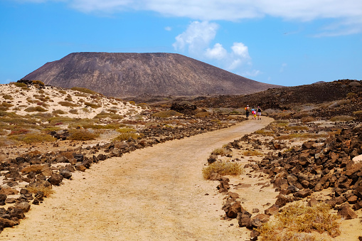 View on the mountain and the road on the island Lobos, belonging to the Canary island Fuerteventura, Spain.