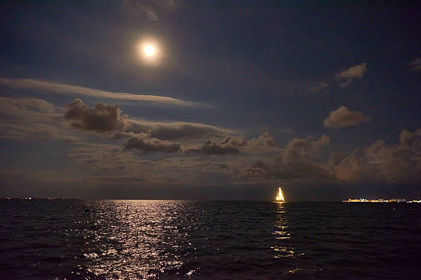istock Ship glowing in the sea 624404910