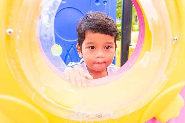 istock Kids playing in playground 624408788