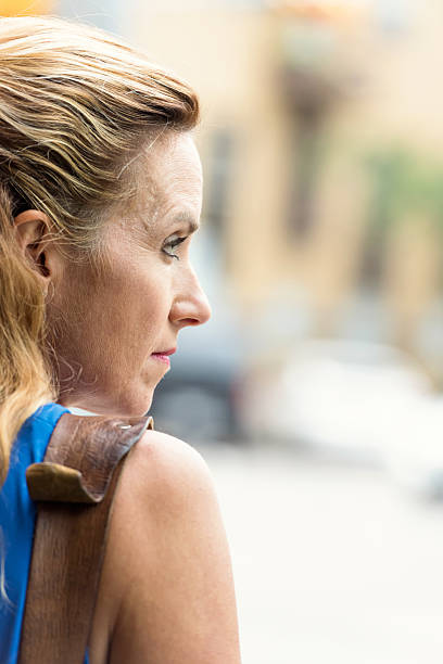 istock Pensive Mature blond woman 624409498