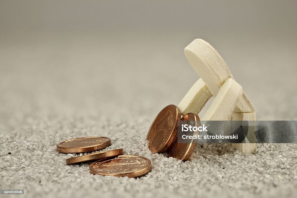 Poor wooden male Poor wooden male turn every cent twice Activity Stock Photo