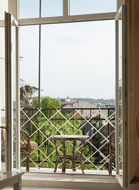 istock Terrace exterior of apartment with table 624432696