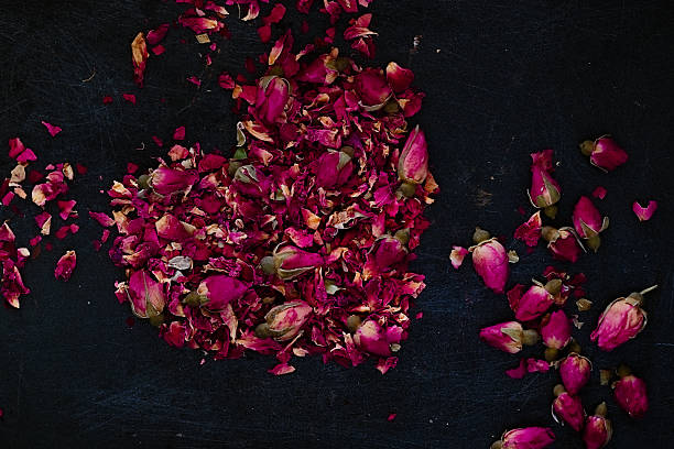 istock Dried rose petals in heart shape 624436848