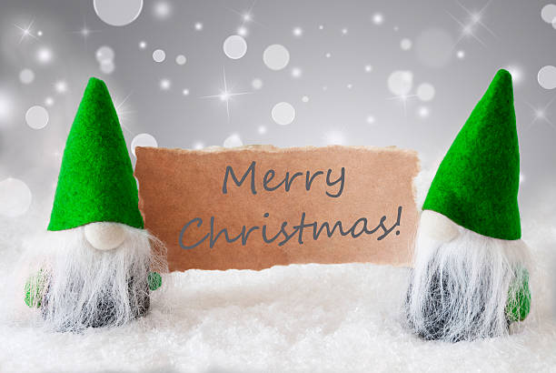 istock Green Gnomes With Card And Snow, Text Merry Christmas 624439224