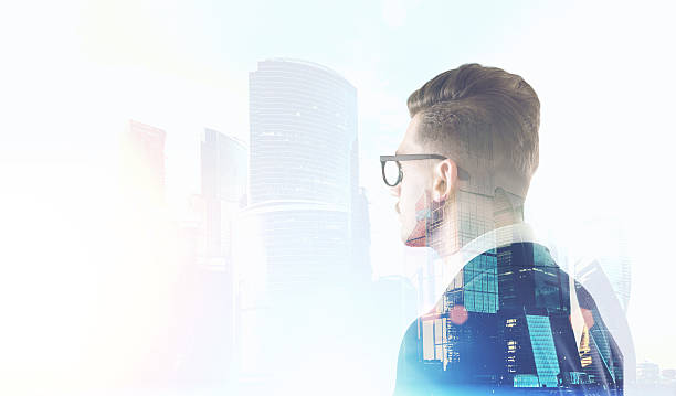 istock Man in glasses looking at Moscow City 624440058