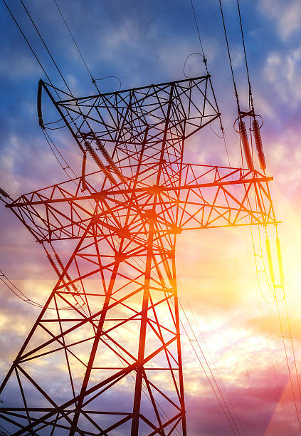 istock High-voltage power line close-up at sunset 624440710