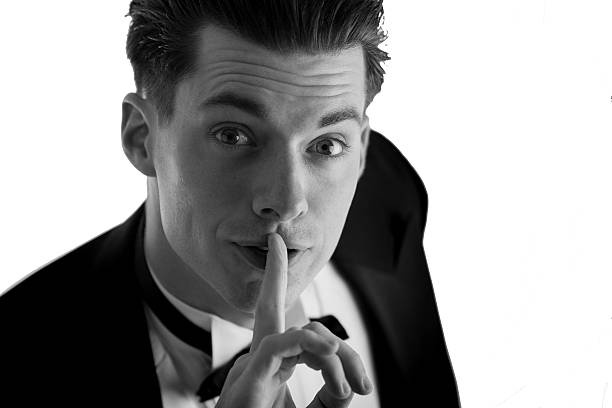 istock Man in tuxedo saying 