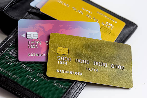 istock Credit cards on white background - online shopping 624457332
