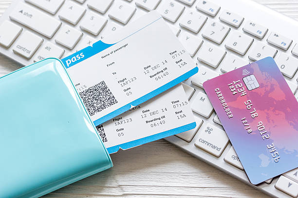 istock credit card on keyboard - buy tickets online 624457902