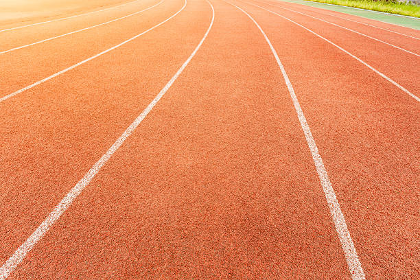 istock running track in the stadium 624458222