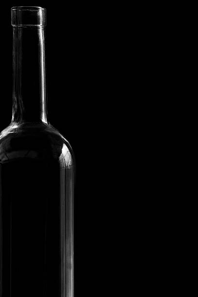 Wine bottles isolated on black background