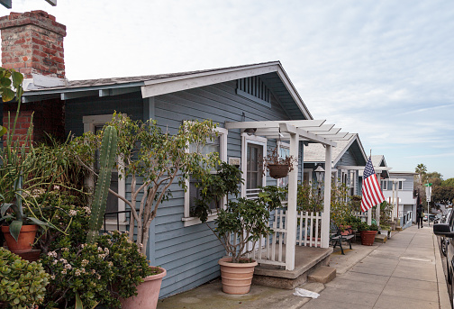 Laguna Beach, CA, USA – November 19, 2016: Beach cottages along Park Street in Laguna Beach, California in summer. Editorial use only.