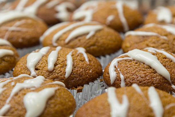 istock Cream Cheese Glaze on Fresh Baked Muffins 624472122