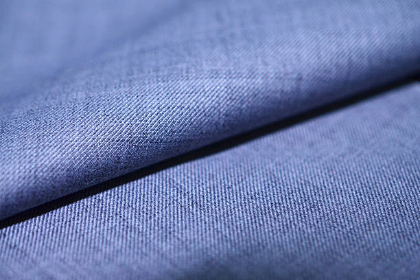 istock close up roll texture light blue fabric of suit 624475258
