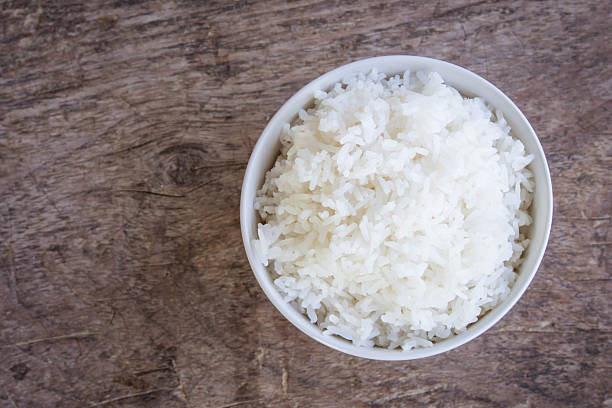 istock raw jasmine rice in white bowl on wooden table 624488720