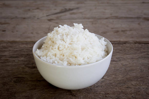 istock raw jasmine rice in white bowl on wooden table 624488738