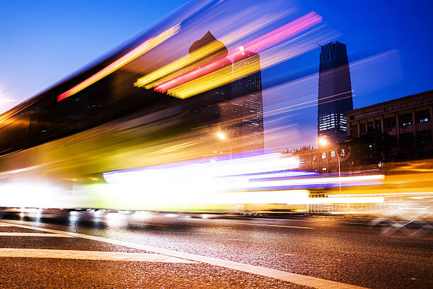 istock Bus Light trails at city night 624489530