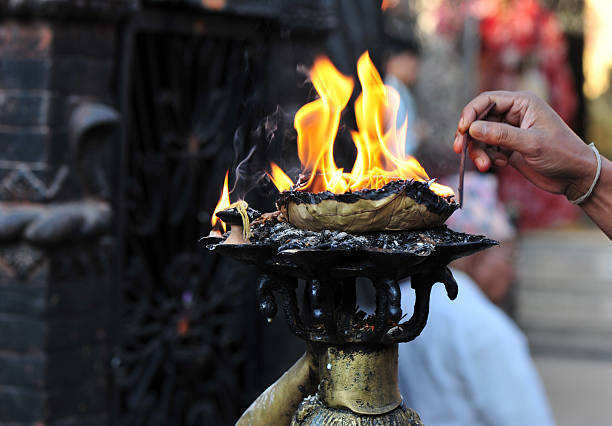 istock Burning fire offerings at Buddhist shrine Kathmandu Nepal 624489566