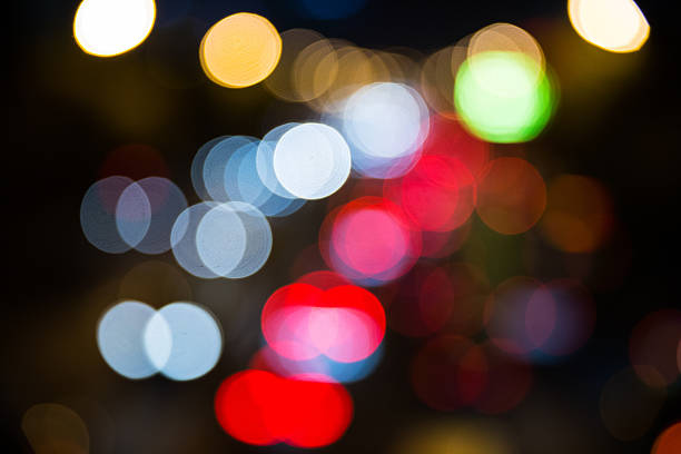 istock defocused city street lights at night 624490196