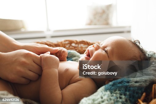 istock Baby smiling at mother, close-up 624492126