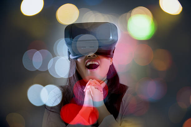 istock Woman wearing virtual reality headset 624494484