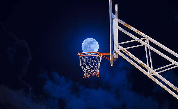 istock moon in a basketball hoop. 624495076