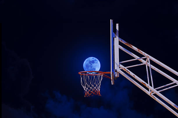 istock moon in a basketball hoop. 624495088
