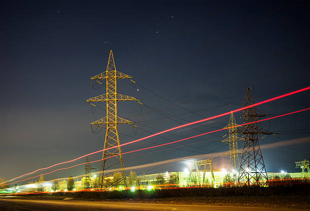 istock distribution electric substation with power lines and transformers, at sunset. 624496814