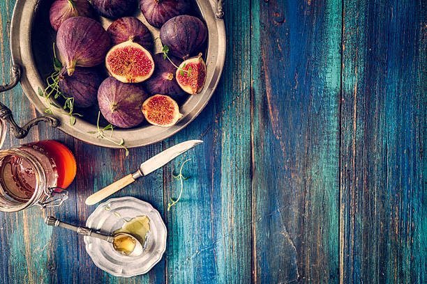 istock Figs and Sweet Honey on Wooden Background 624510174