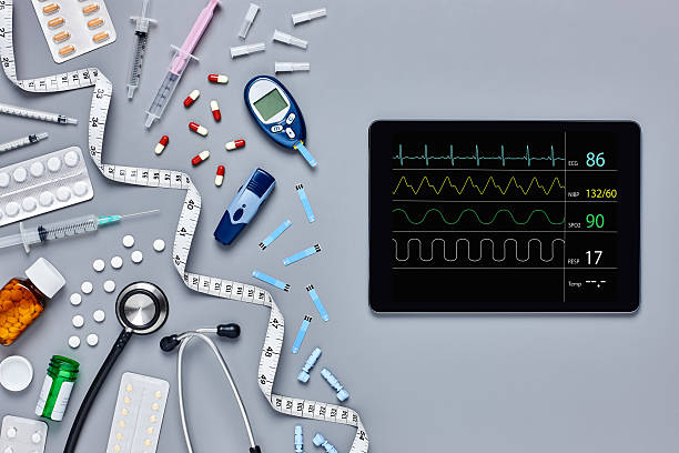 istock Medical supplies with computer displaying pulse trace 624510426