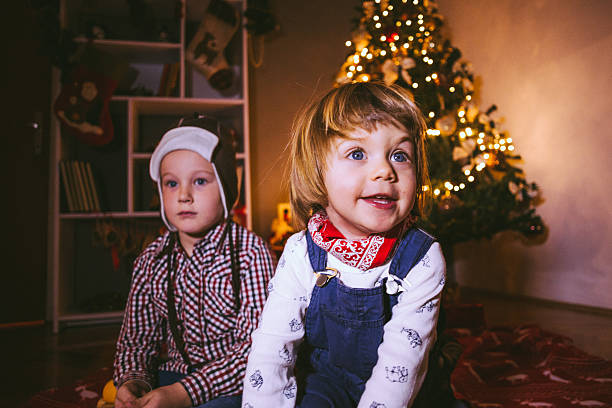 istock Ecstatic Children Celebrating Christmas 624511118