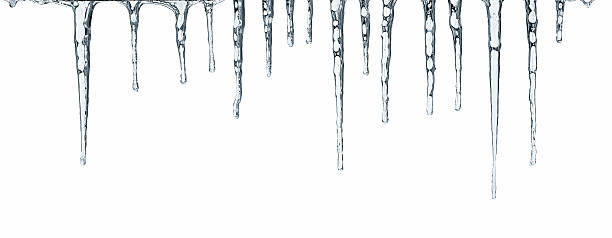 Icicles isolated on white Close up of icicles isolated on white background icicle photos stock pictures, royalty-free photos & images