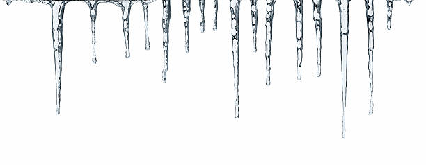 Icicles isolated on white Close up of icicles isolated on white background icicles melting stock pictures, royalty-free photos & images