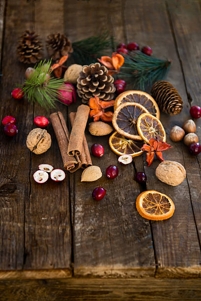 istock Xmas Symbols such as nuts, orange slices, tree branches, cranber 624532168