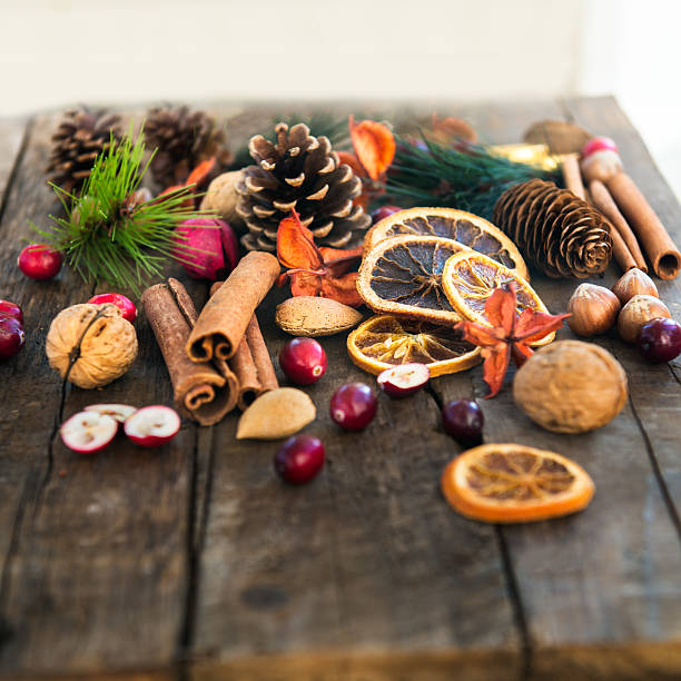 istock Xmas Symbols such as nuts, orange slices, tree branches, cranber 624532430