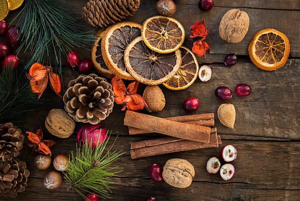 istock Xmas Symbols such as nuts, orange slices, tree branches, cranber 624532702