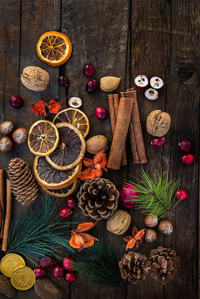 istock Xmas Symbols such as nuts, orange slices, tree branches, cranber 624532862