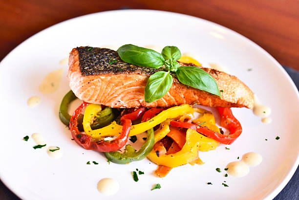 istock Delicious salmon filet on a white plate 624532944