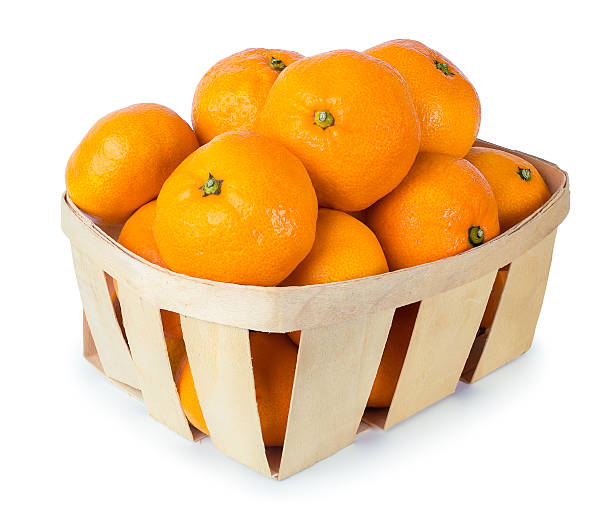istock tangerines in basket isolated on white 624533156