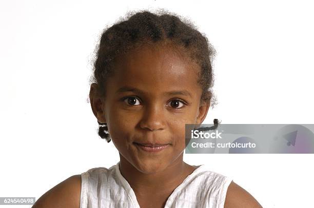 Portrait Of A African Young Girl Stock Photo - Download Image Now - 6-7 Years, African Ethnicity, Girls