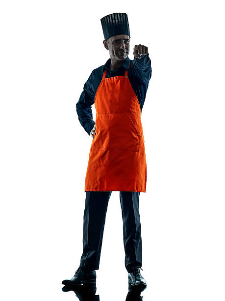 istock man cooking chef silhouette isolated 624541730
