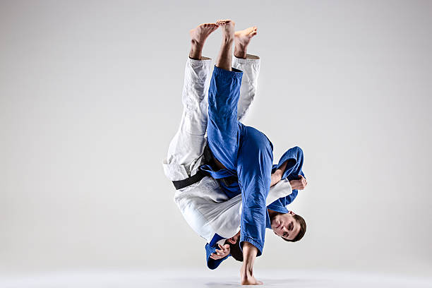 istock The two judokas fighters fighting men 624543142