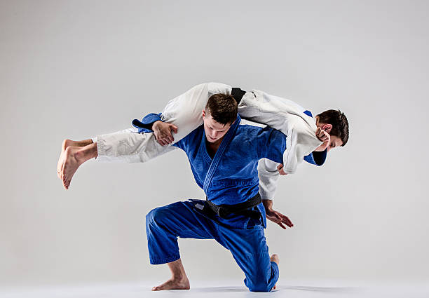 istock The two judokas fighters fighting men 624544032