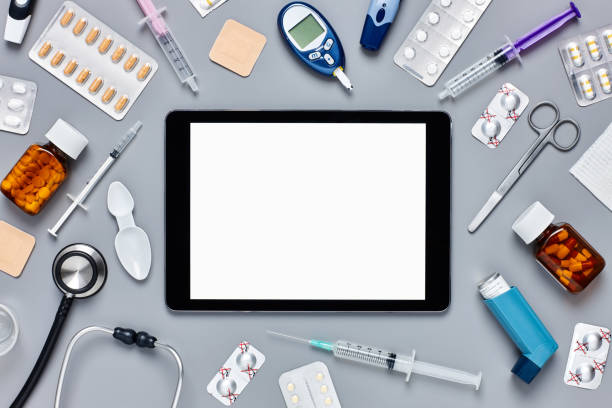 istock Flat lay of digital tablet surrounded with medical equipment 624544240
