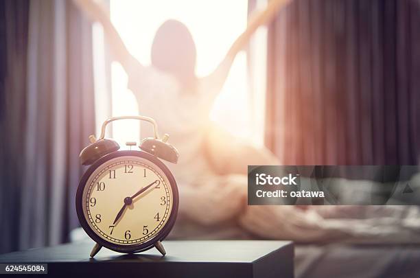 Alarm Clock Having A Good Day In Morning Stock Photo - Download Image Now - Morning, Routine, Waking up