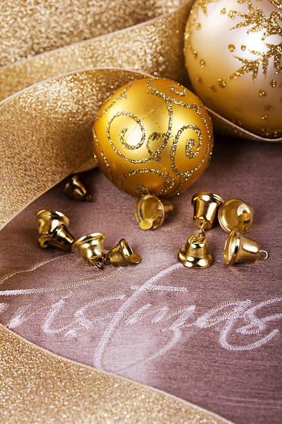 istock Festive gold Christmas decorations on fabric background 624546078