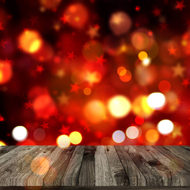 istock 3D wooden table on Christmas bokeh lights background 624546510
